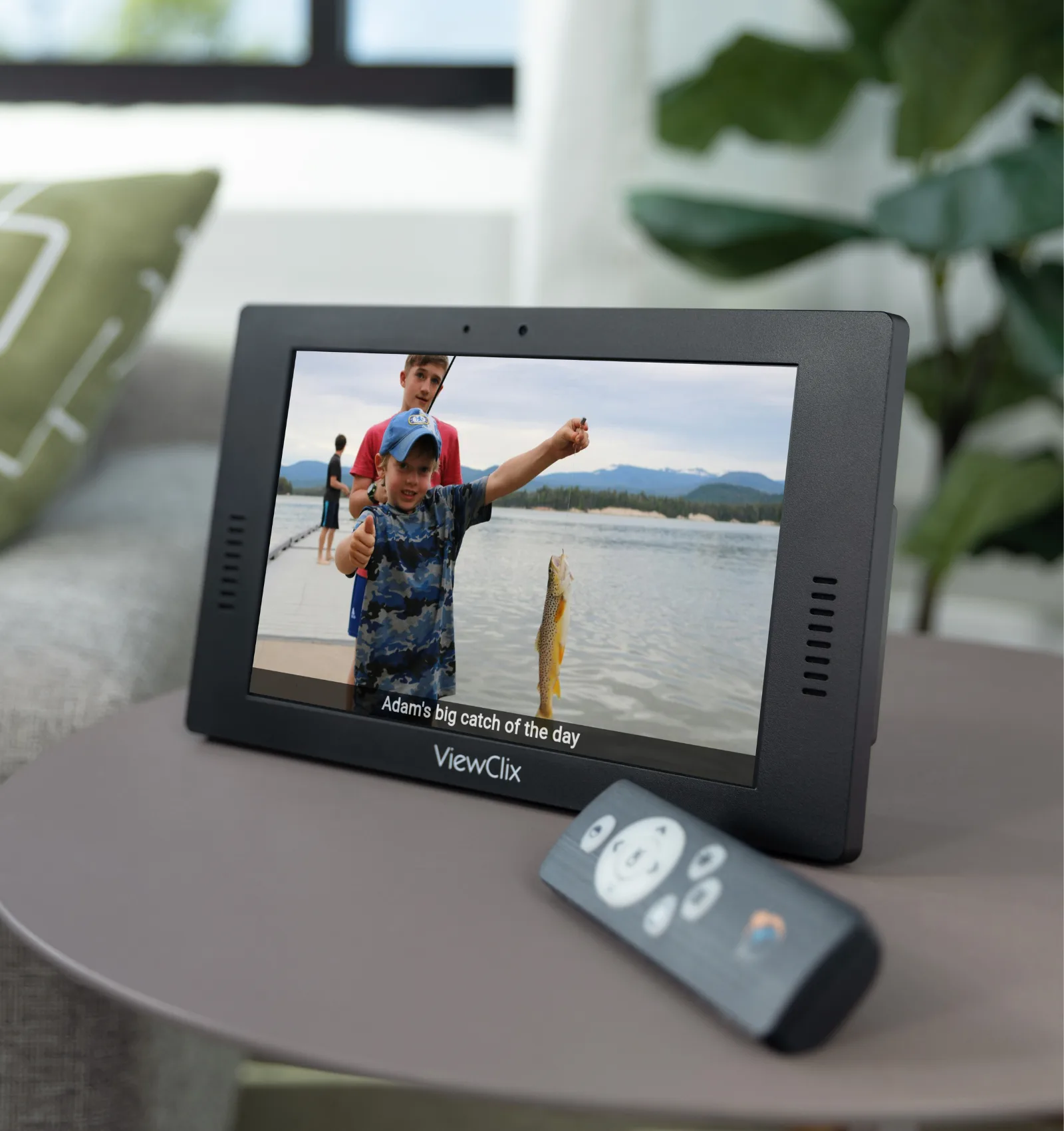 ViewClix frame displaying a shared family photo on a table
